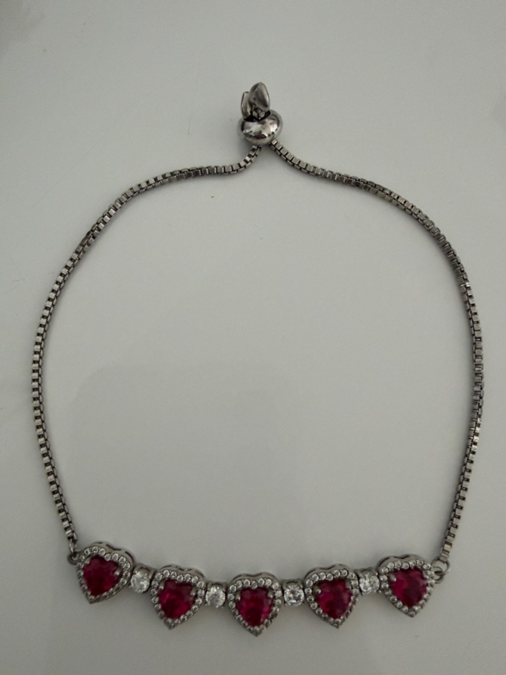 Silver Tone Heart Ruby Bracelet with Crystal Accents